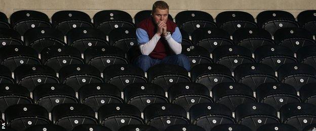 An Aston Villa fan at Hull's KC Stadium