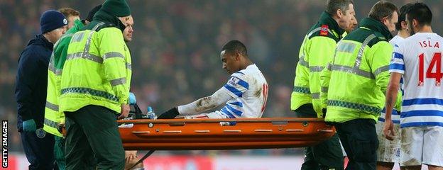 Leroy Fer is stretchered off