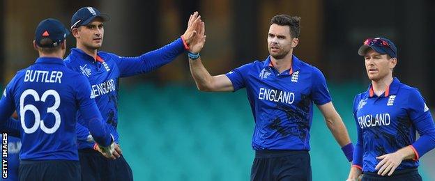 England celebrate a wicket by James Anderson (centre)