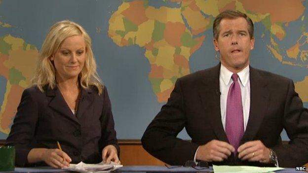 Amy Poehler and Brian Williams prepare for skit on Saturday Night Live's Weekend Update