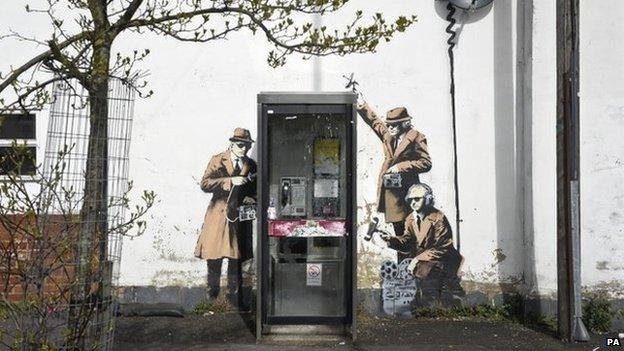 Banksy's Spy Booth artwork in Cheltenham