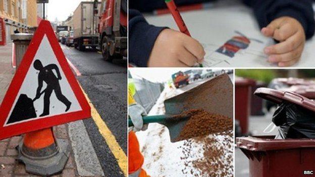 Traffic sign, child writing, road being dug up, and bins waiting to be emptied