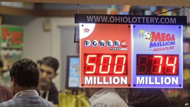 A Powerball sign hangs in an Ohio store window.