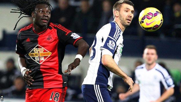 Bafetimbi Gomis and Gareth McAuley