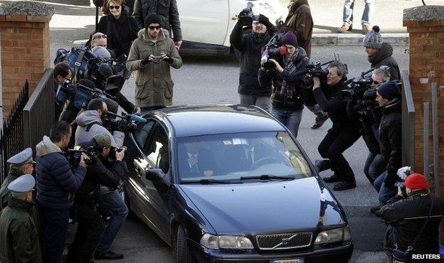 Members of the media surround Costa Concordia captain Francesco Schettino as he arrives at court - 11 February 2015