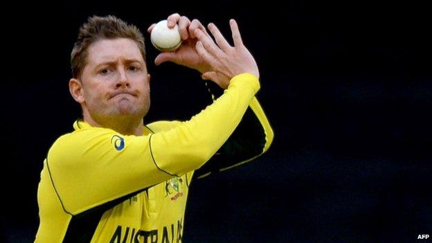 Michael Clarke bowls during the one-day international World Cup warm-up cricket match between Australia and the UAE in Melbourne (11 February 2015)