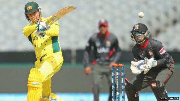 Michael Clarke of Australia hits a boundary against the UAE (11 February 2015)