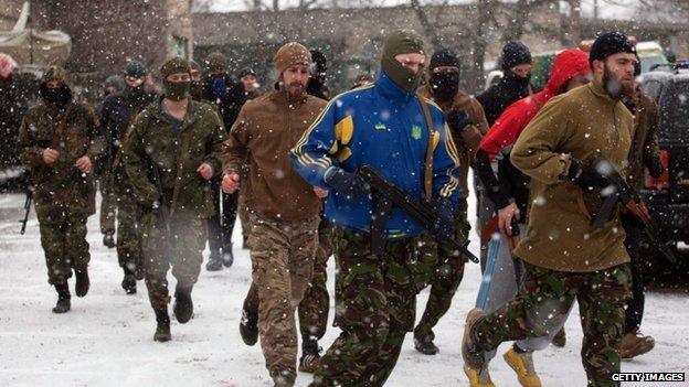 Fighters from the Azov Battalion, an all-volunteer paramilitary militia affiliated with the Ukraine government