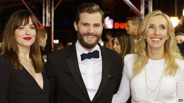 Dakota Johnson, Jamie Dornan and director Sam Taylor-Johnson at the film's Berlin premiere