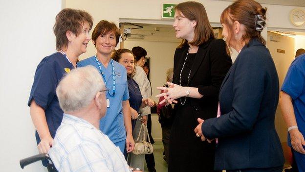 Kirsty Williams with hospital staff and patients