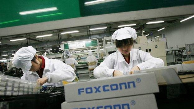 Employees into a Foxconn factory