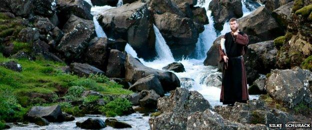 A member of the Asatru Association stands by a river at the Pingvellir National Park near Reykjavik in 2012