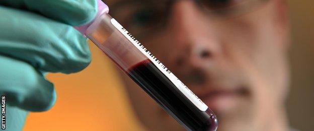 An anti-doping expert analyses a blood sample