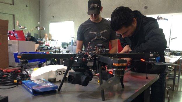 Jordi Munoz and a colleague in the workshop