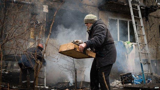 Heavy shelling has left residents of Donetsk attempting to pick up the pieces