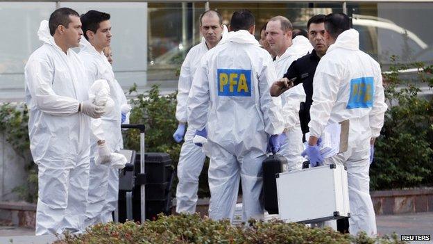 A team of police investigators arrive at Le Parc Tower where the late prosecutor Alberto Nisman was found dead