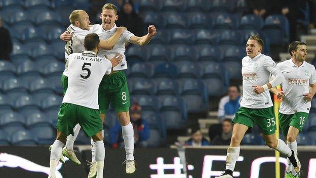 Hibernian's Scott Robertson (third right) celebrates scoring the opening goal.