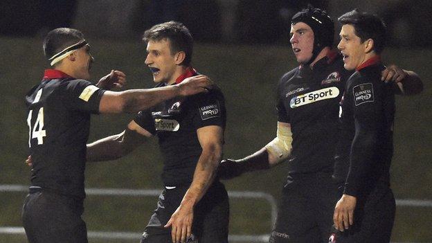 Edinburgh Rugby's Tom Brown (centre) celebrates after scoring a try