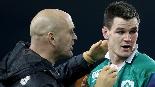 Jonathan Sexton sustained a cut eye after a clash of heads with France's Mathieu Bastareaud