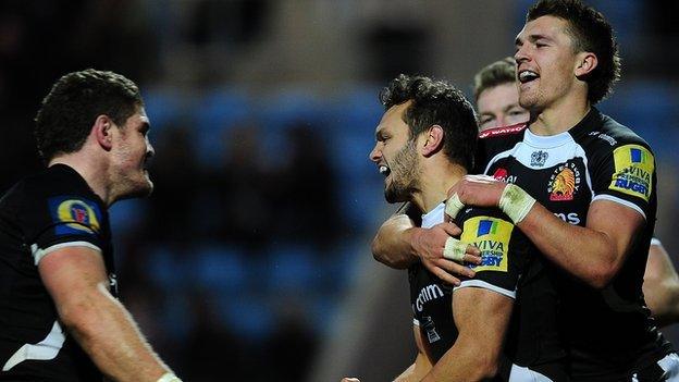 Exeter celebrate a try against Newcastle