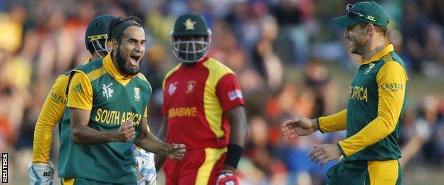 South Africa celebrate a wicket by Imran Tahir (left)