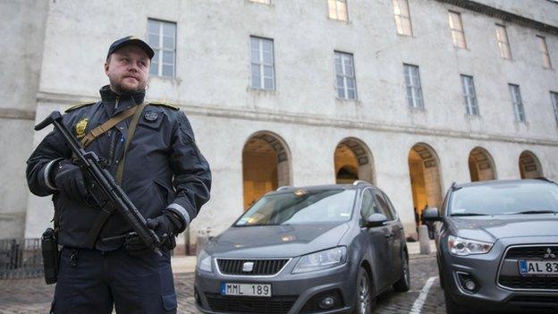 Armed officer outside Copenhagen police headquarters. 15 Feb 2015