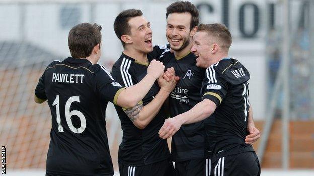 Aberdeen won 3-0 at Hamilton to stay three points behind Premiership leaders Celtic