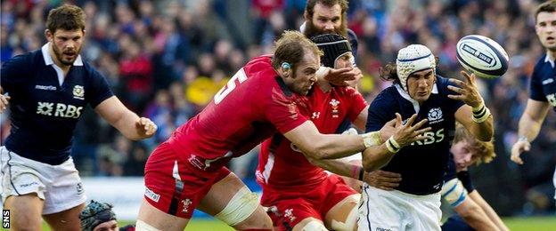 Blair Cowan is challenged by Alun Wyn Jones