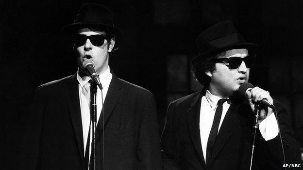 Dan Aykroyd as Elwood Blues and John Belushi as Jake Blues