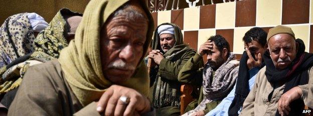 Relatives of Egyptian Coptic Christian workers mourn. 15 February 2015