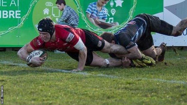 Drew Locke scores a try for Jersey against Bedford