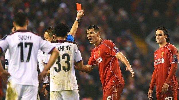 Lazar Markovic (right) shown the red card against Basel