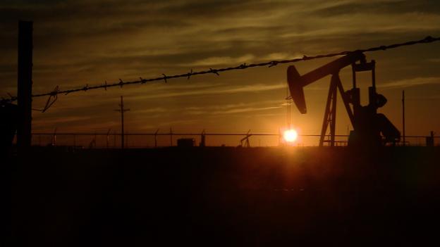 Sunset over the oil wells