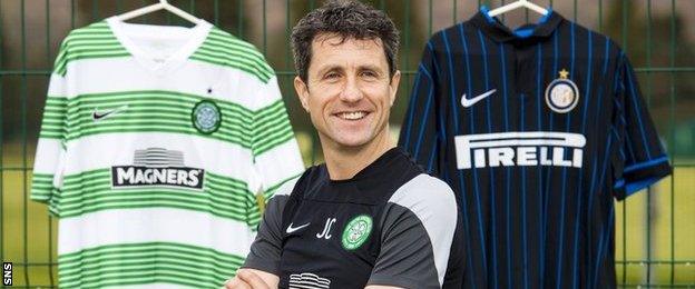 John Collins poses with Celtic and Inter Milan jerseys