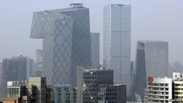 The China Central Television hq (tallest building on left) in Beijing"s central business district 20/01/2015