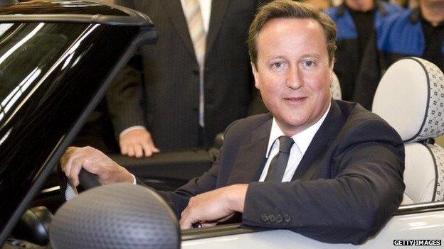 Prime Minister David Cameron drives the two millionth MINI off the production line, after ten years of production, at the MINI Plant Oxford on August 31, 2011 in Oxford, England.