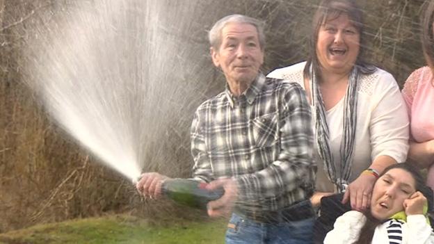 Paul and Debbie Lawton with champagne