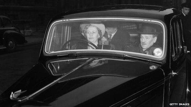 British Labour Prime Minister Clement Attlee (1883 - 1967) leaves Downing Street with his wife Violet at the beginning of a thousand-mile election tour, 8th February 1950.