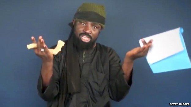 This screen grab image taken on February 18, 2015 from a video made available by Islamist group Boko Haram shows Boko Haram leader Abubakar Shekau making a statement at an undisclosed location