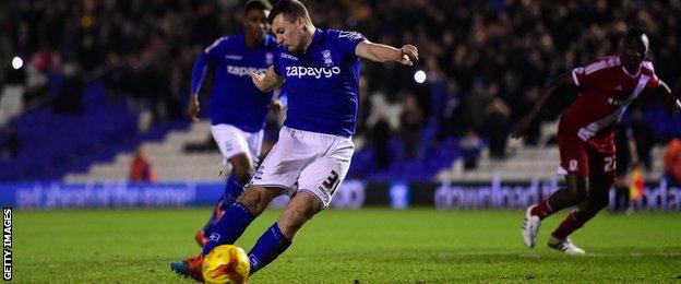 Birmingham defender Paul Caddis scores a penalty