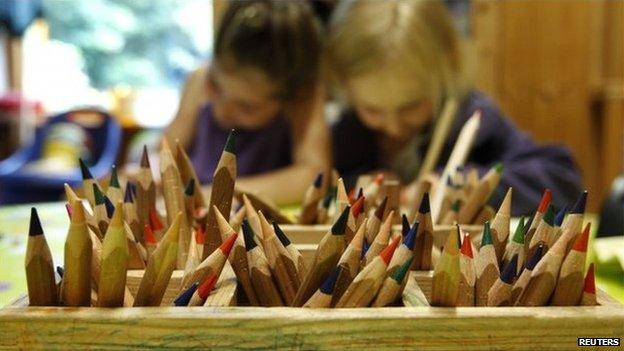 Children colouring at nursery