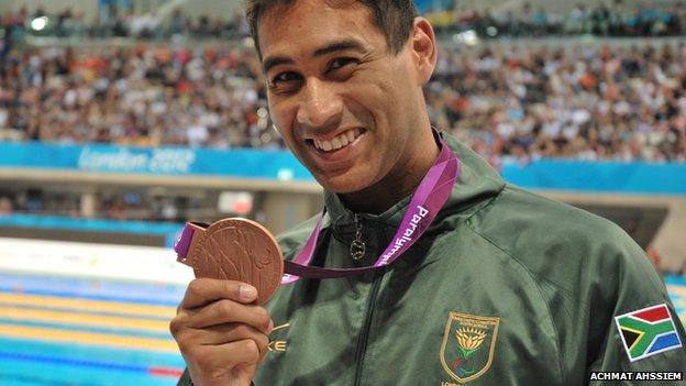 Achmat Hassiem with the bronze medal he won at the London Paralympics