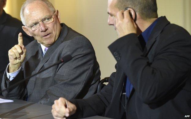 Greece's new Finance Minister Yanis Varoufakis (right) with his German counterpart Wolfgang Schaeuble at a press conference in Berlin on 5 February 2015