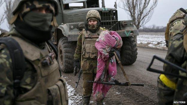 Ukrainian servicemen who fought in Debaltseve are seen near Artemivsk