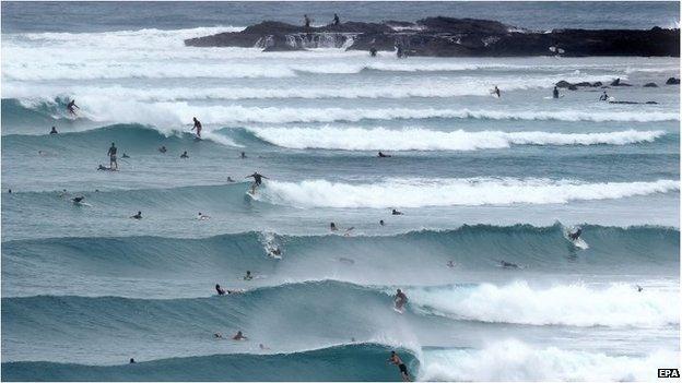 Surfers during Tropical Cyclone Marcia at Snapper Rocks on the Gold Coast (20 Feb 2015)