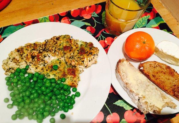 Peas, fish, bread, satsuma and cheese