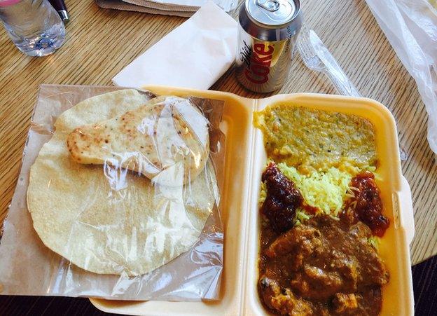 Take away curry and a canned drink