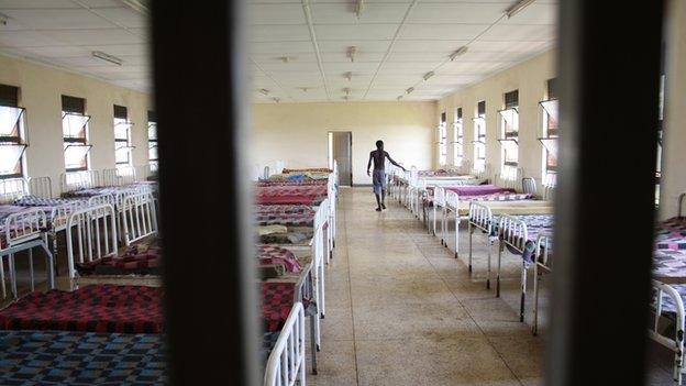 A patient helps clean a ward at Butabika Hospital.