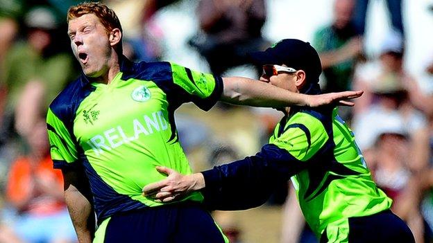 Kevin O'Brien is congratulated by Ireland team-mate and brother Niall O'Brien after dismissing West Indies batsman Dwayne Smith on Monday