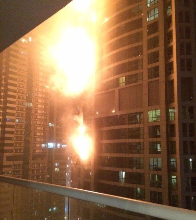 A high rise tower in Dubai on fire